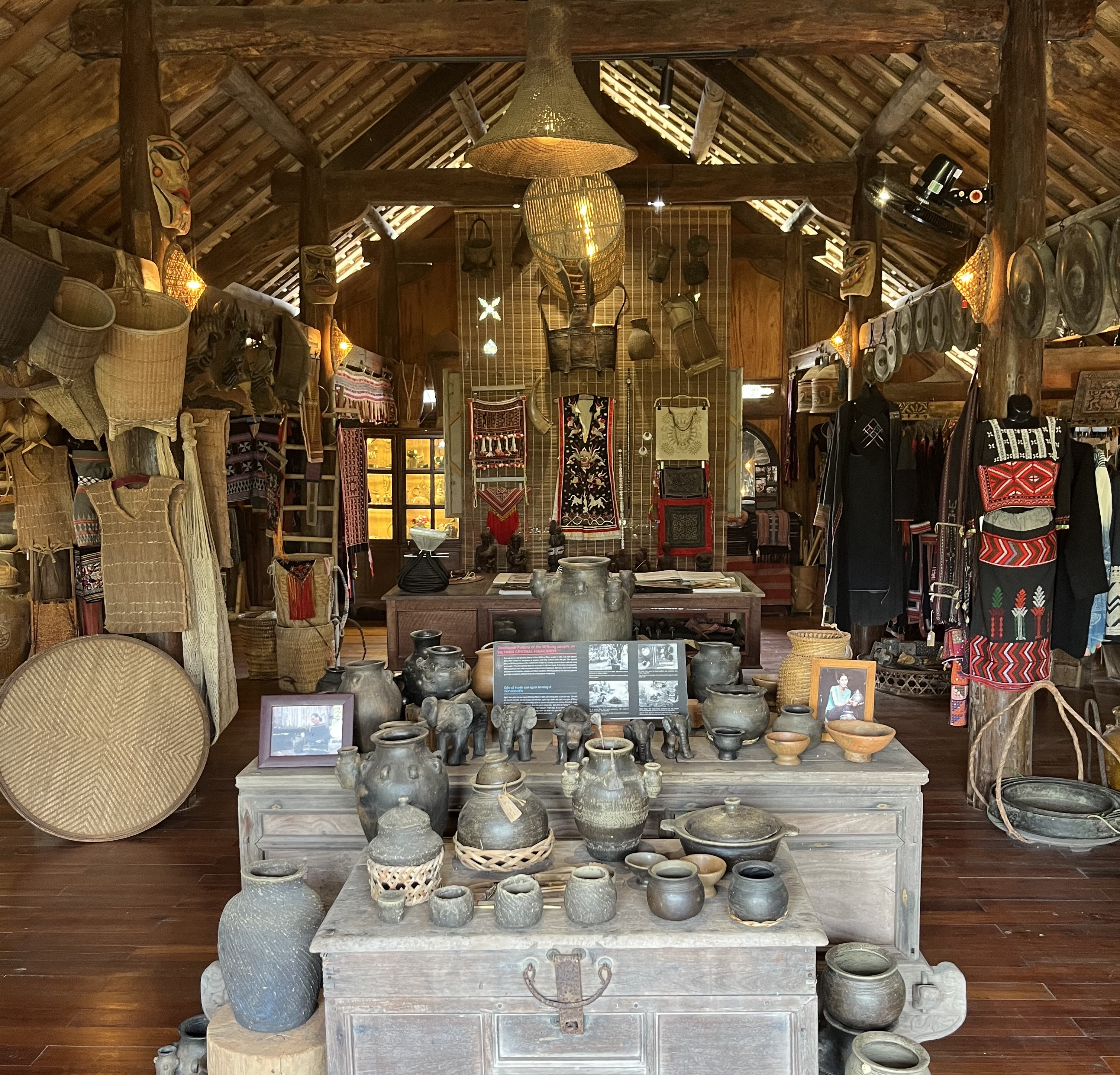 Traditional Vietnamese shop selling indigo-dyed hemp fabric and handmade minority crafts.